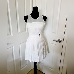 Bebe | Cute Ivory Pleated Sleeveless Fit & Flare Cocktail Dress